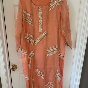 Orange and Gold Midi Dress with 3/4 Sleeves and Crew Neck for Casual Wear.